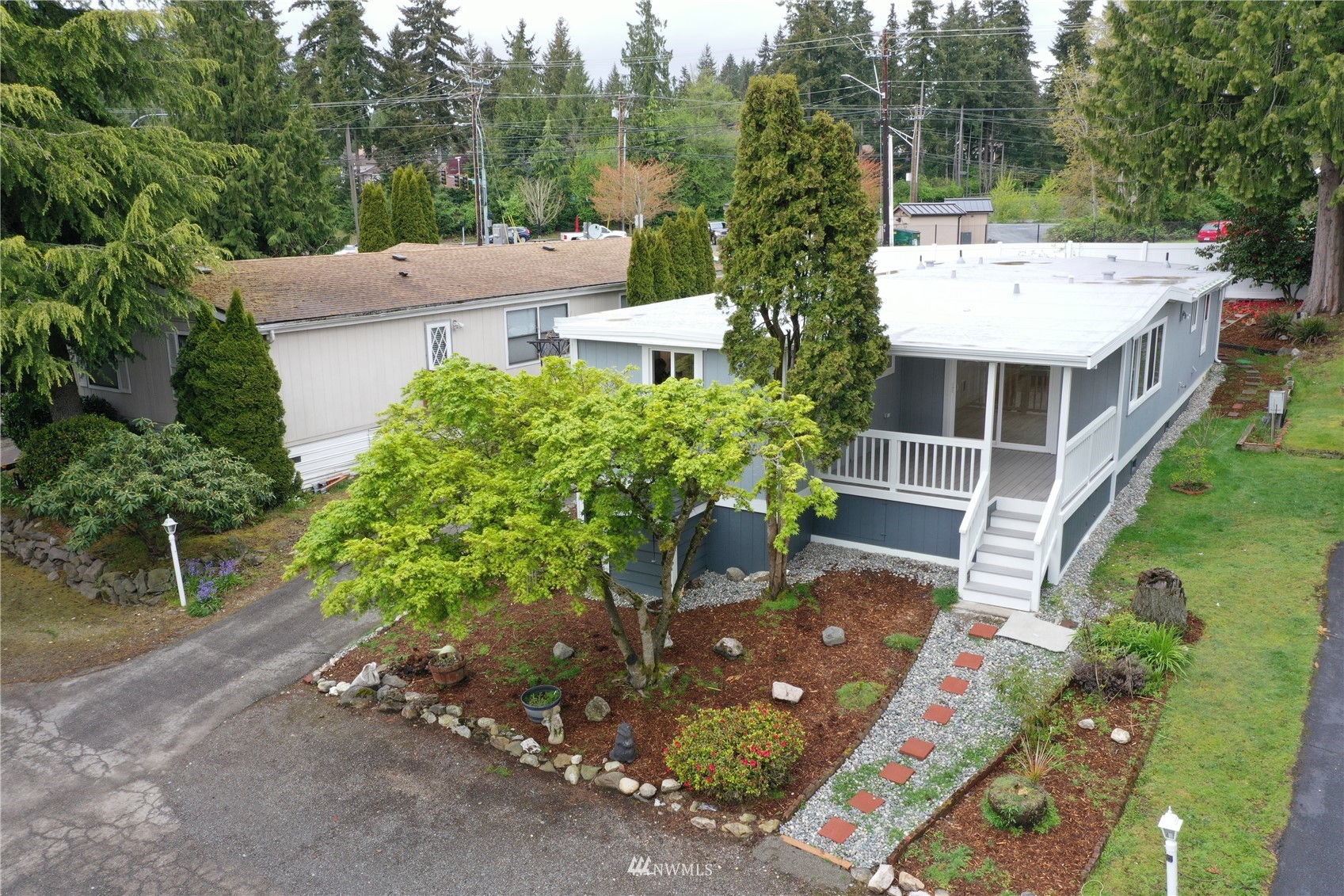 3504 Seattle Hill Road, Unit 2 Mill Creek, WA 98012 - Photo 29 of 30 a view of a house with a yard and potted plants