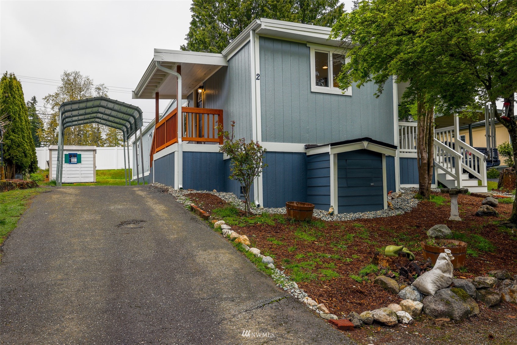 3504 Seattle Hill Road, Unit 2 Mill Creek, WA 98012 - Photo 3 of 30 a view of a house with a yard