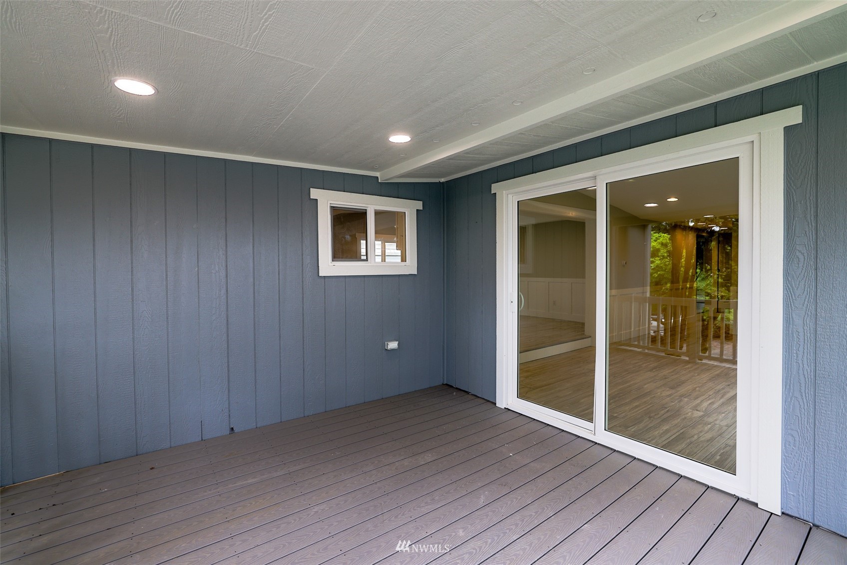 3504 Seattle Hill Road, Unit 2 Mill Creek, WA 98012 - Photo 4 of 30 an empty room with wooden floor and windows