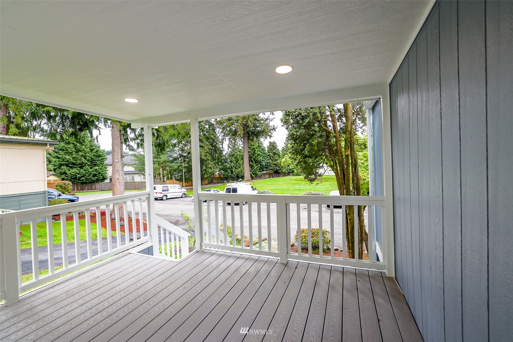 3504 Seattle Hill Road, Unit 2 Mill Creek, WA 98012 - Photo 5 of 30 a view of a wooden deck