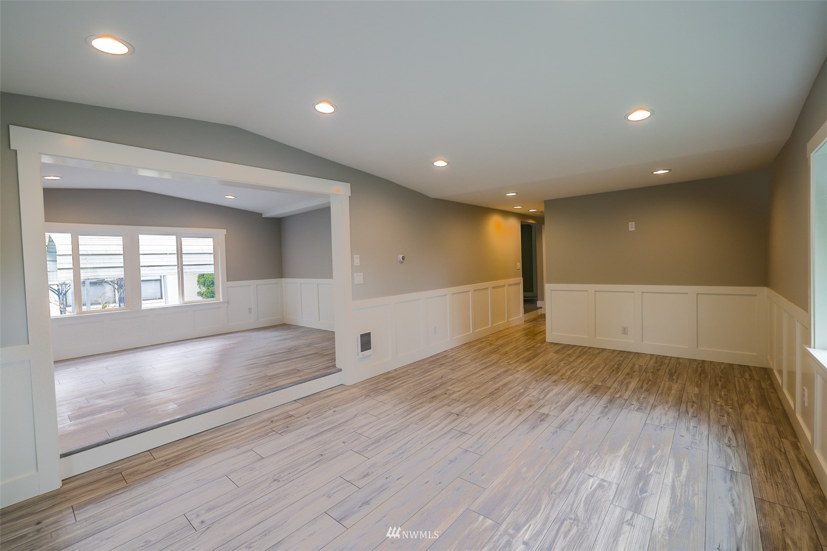 3504 Seattle Hill Road, Unit 2 Mill Creek, WA 98012 - Photo 6 of 30 an empty room with wooden floor and windows
