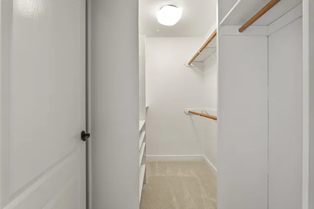 a view of a bathroom with a glass door