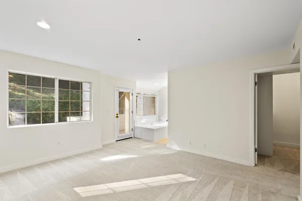 a view of empty room with front door