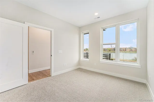 a view of a bathroom with sink and shower
