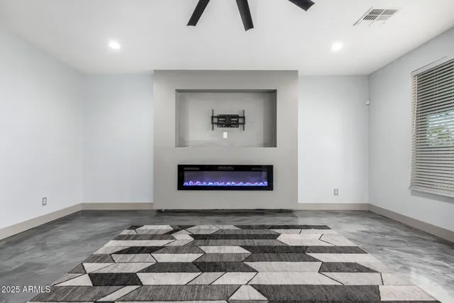 an empty room with windows