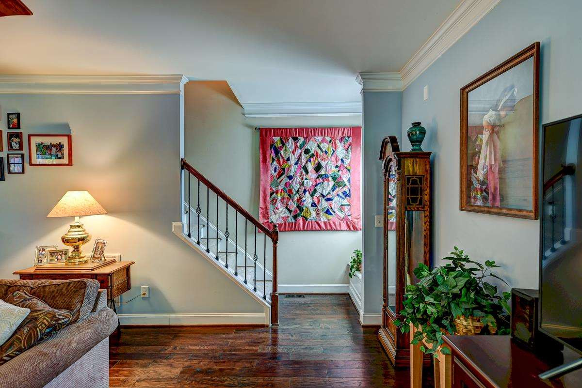 1212 Barnford Mill Road Wake Forest, NC 27587 - Photo 13 of 30 Really it's the stairway to the second and third floor areas. Please note that the treads are made of solid hardwood and the seller's have just installed a brand new runner. Stairway to Heaven