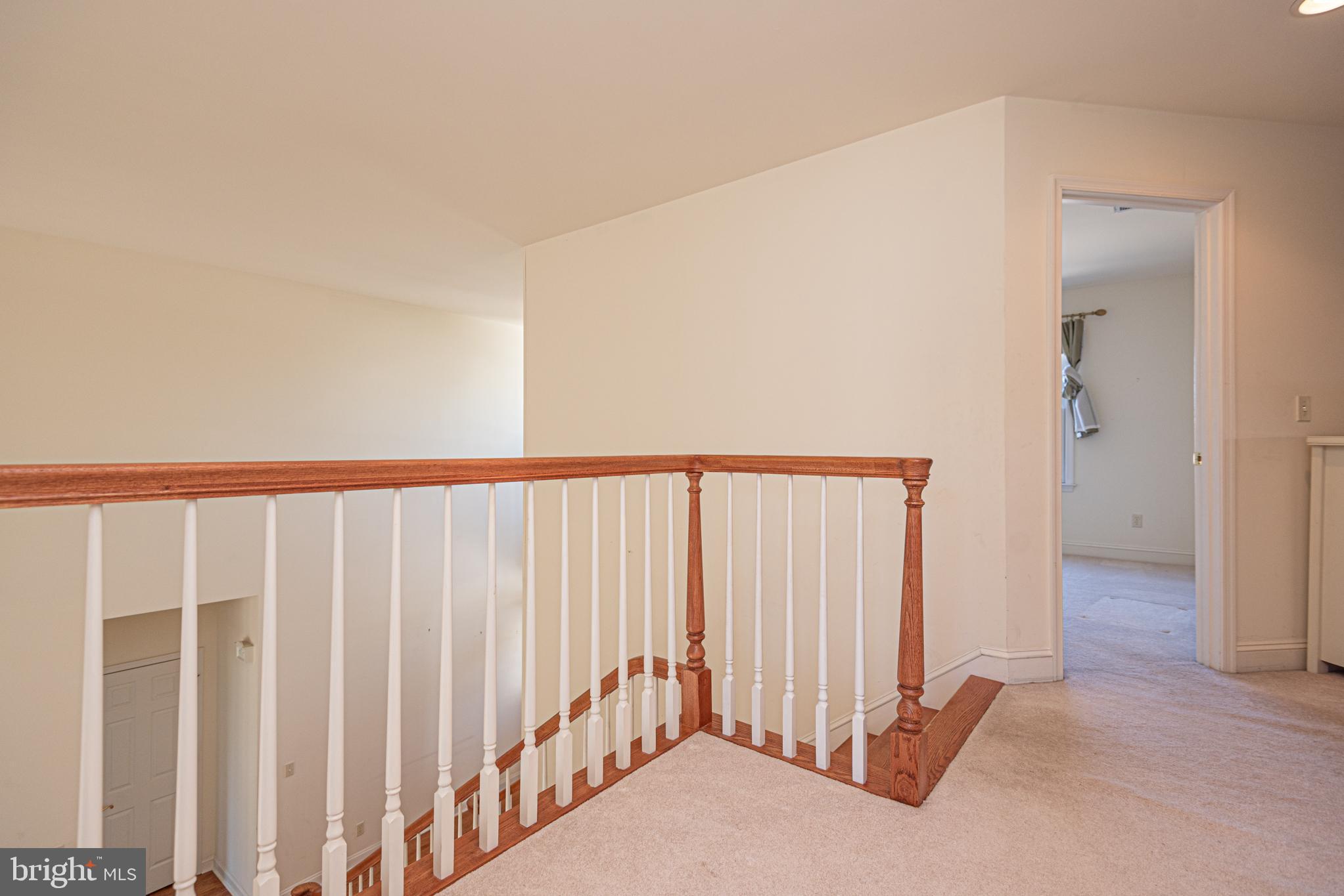 6023 Tarry Town Road Salisbury, MD 21801 - Photo 40 of 61 Bright and airy upper landing with elegant rail...