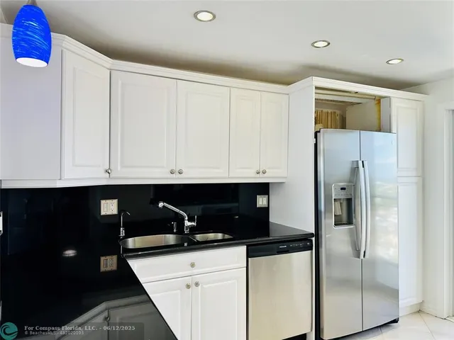 a room with furniture and air hockey table