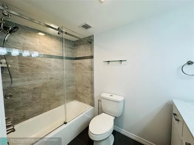 a view of yard with swimming pool