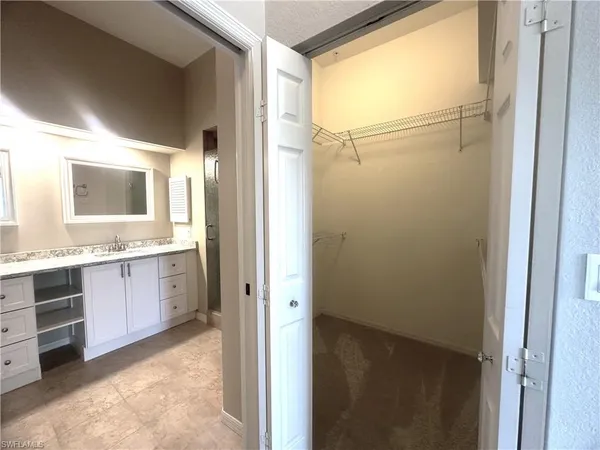 $2,400 | 6922 Satinleaf Road North, Unit 203, Naples, FL 34109