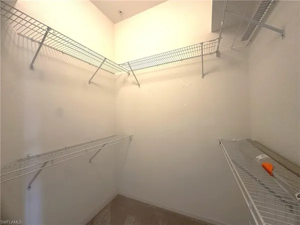 $2,400 | 6922 Satinleaf Road North, Unit 203, Naples, FL 34109