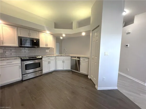 $2,400 | 6922 Satinleaf Road North, Unit 203, Naples, FL 34109