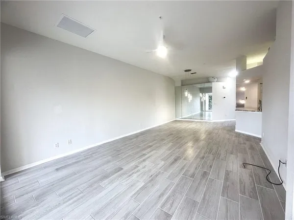 $2,400 | 6922 Satinleaf Road North, Unit 203, Naples, FL 34109