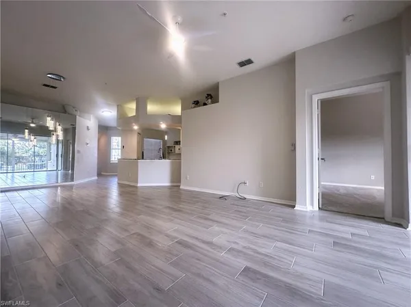 $2,400 | 6922 Satinleaf Road North, Unit 203, Naples, FL 34109