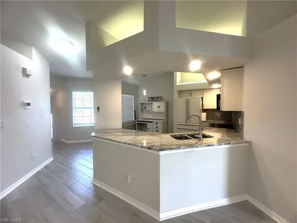 $2,400 | 6922 Satinleaf Road North, Unit 203, Naples, FL 34109