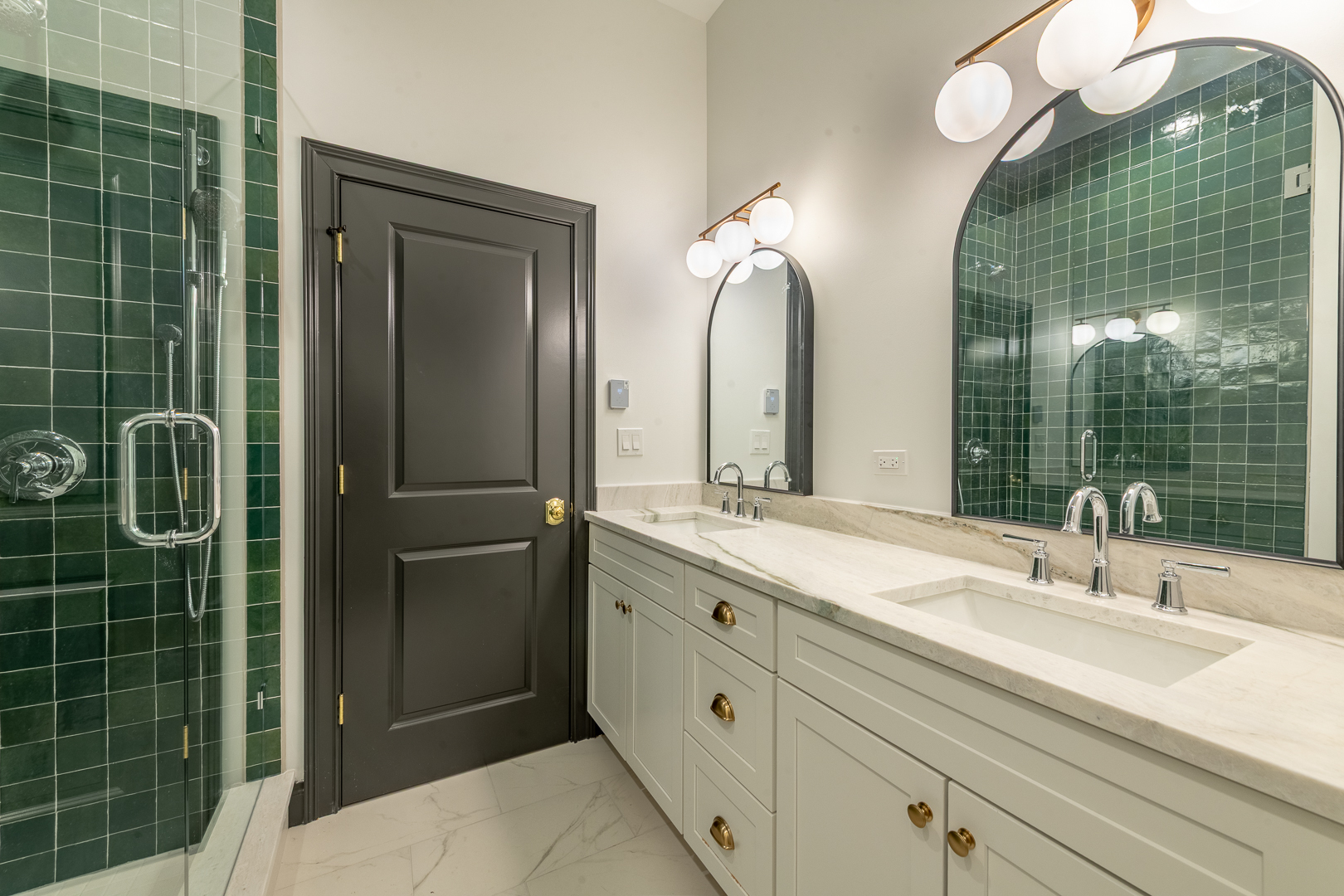 28 North Throop Street, Unit 2 Chicago, IL 60607 - Photo 22 of 35 a bathroom with a double vanity sink mirror and shower