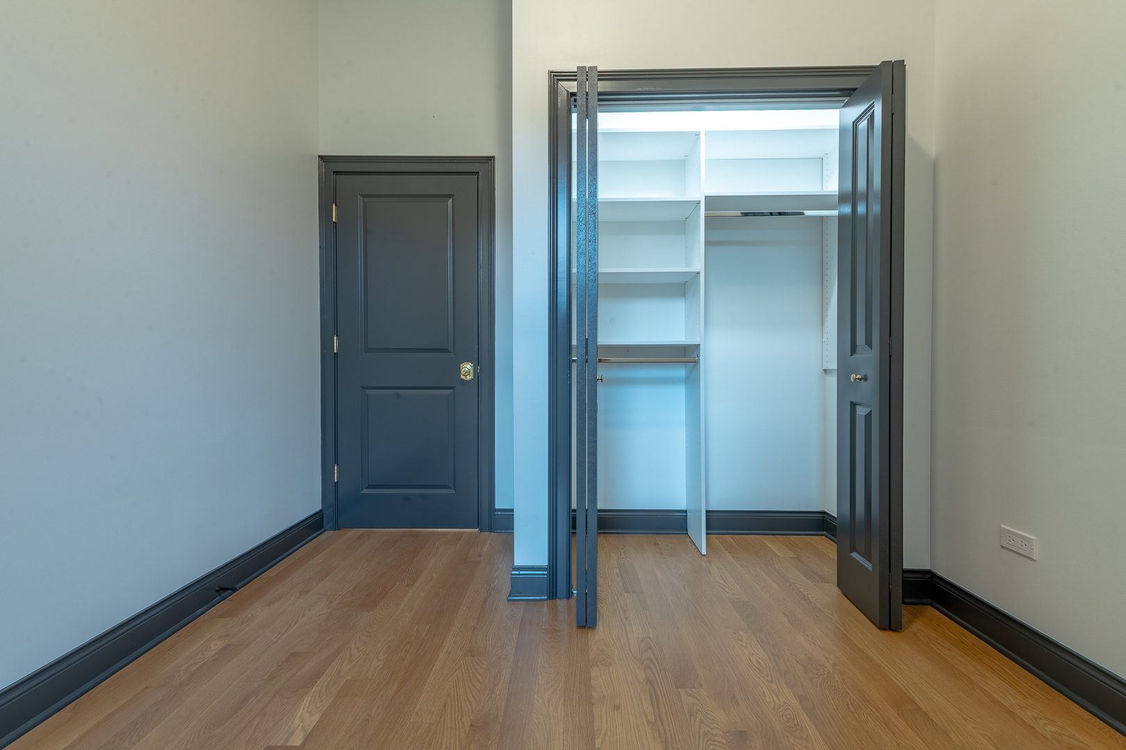 28 North Throop Street, Unit 2 Chicago, IL 60607 - Photo 30 of 35 wooden floor and closet in a room