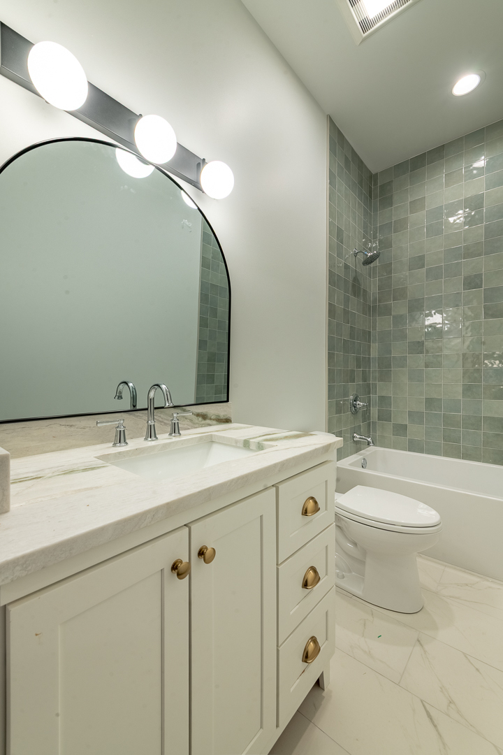 28 North Throop Street, Unit 2 Chicago, IL 60607 - Photo 31 of 35 a bathroom with a double vanity sink toilet and shower