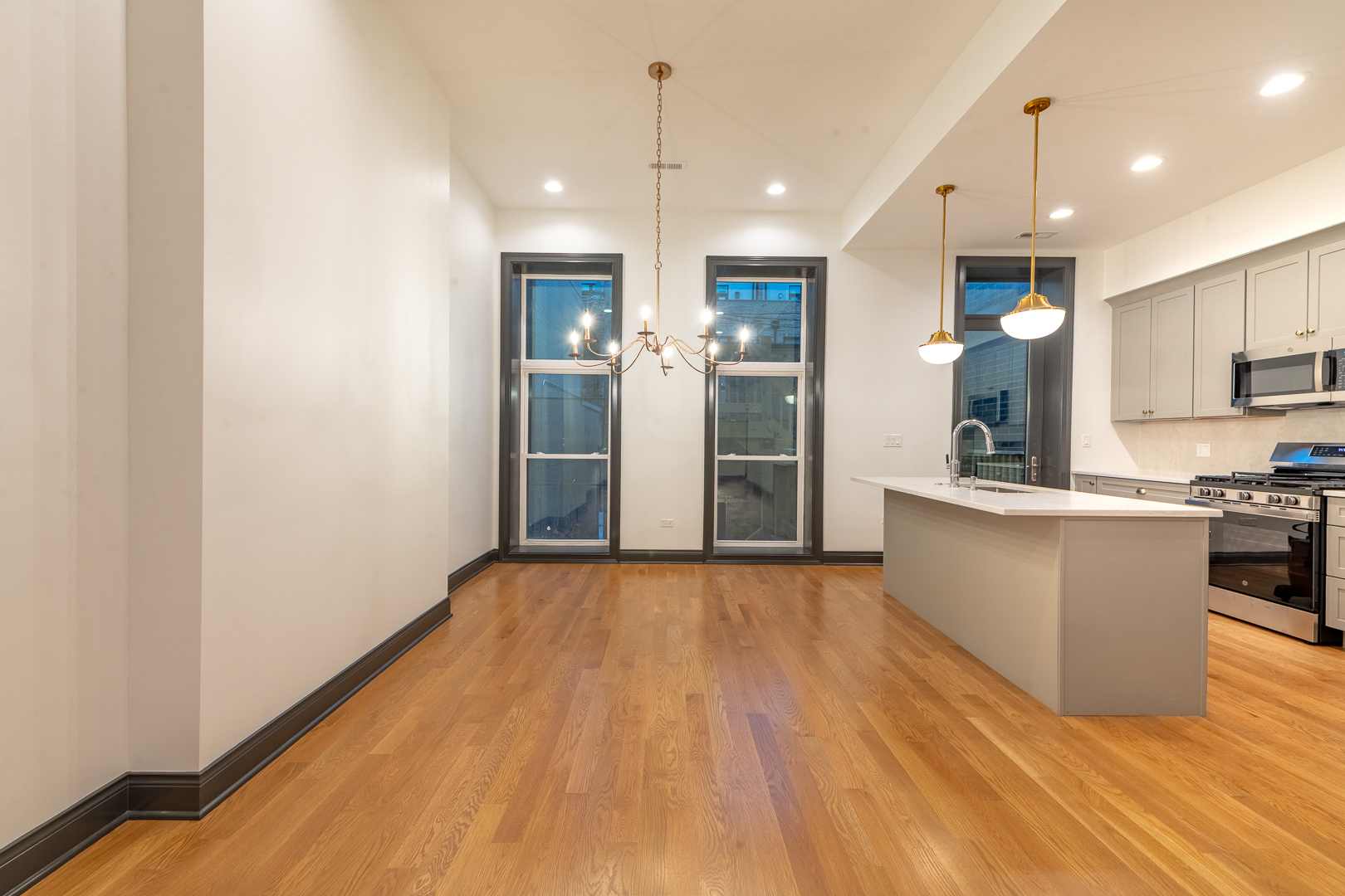 28 North Throop Street, Unit 2 Chicago, IL 60607 - Photo 7 of 35 a view of kitchen with cabinets and wooden floor