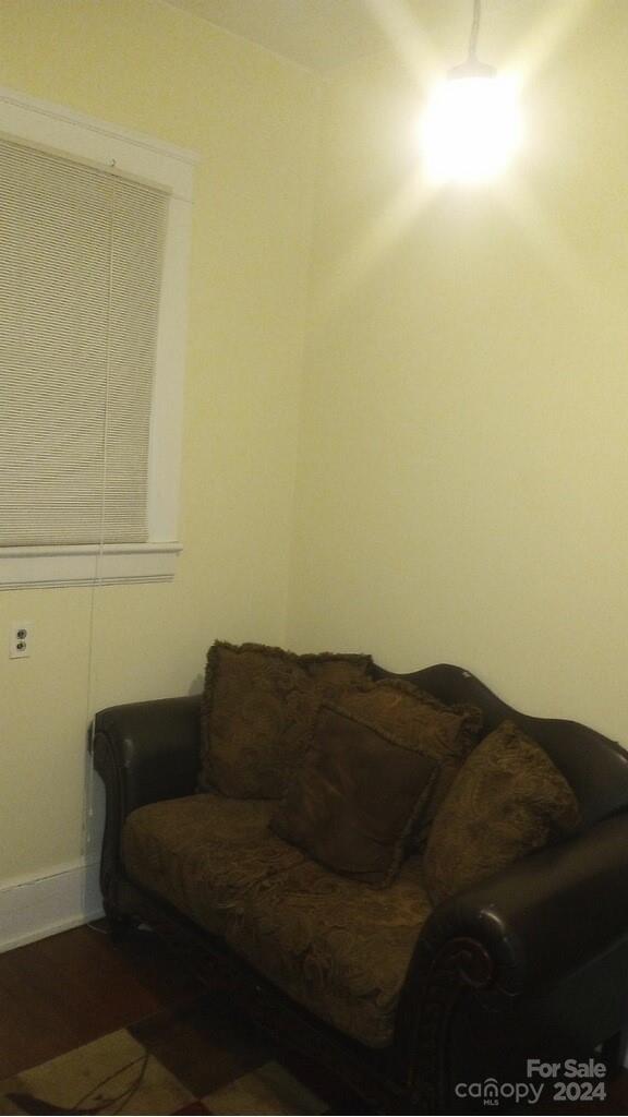 143 Lancaster Street Chester, SC 29706 - Photo 20 of 29 a living room with furniture and a lamp