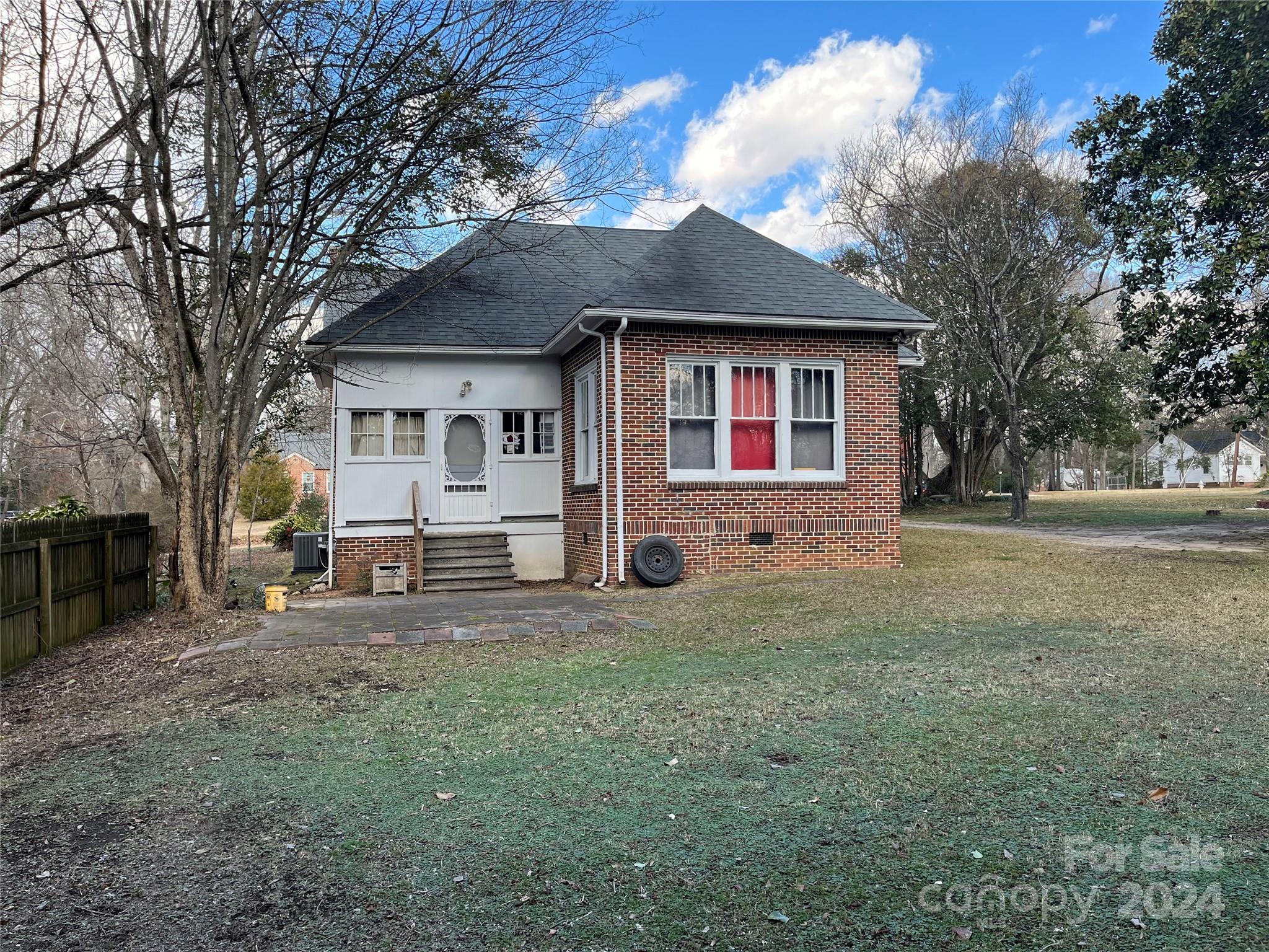 143 Lancaster Street Chester, SC 29706 - Photo 2 of 29 a front view of a house with a yard