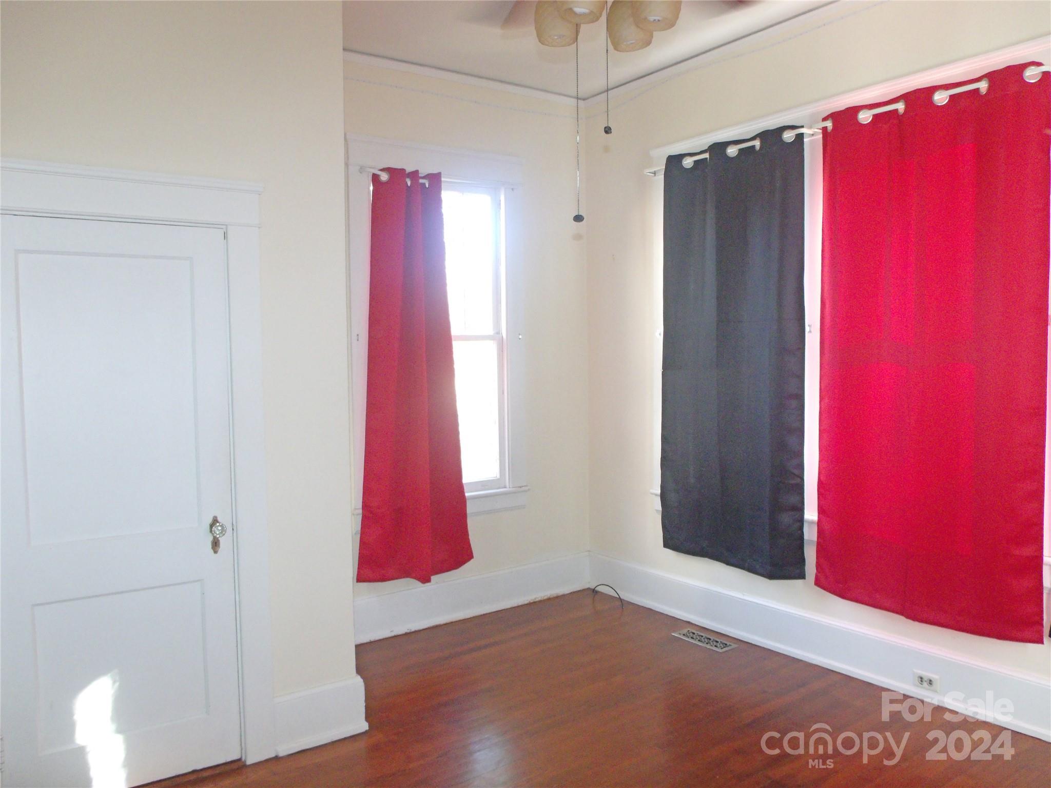 143 Lancaster Street Chester, SC 29706 - Photo 24 of 29 a view of a room with wooden floor and a window