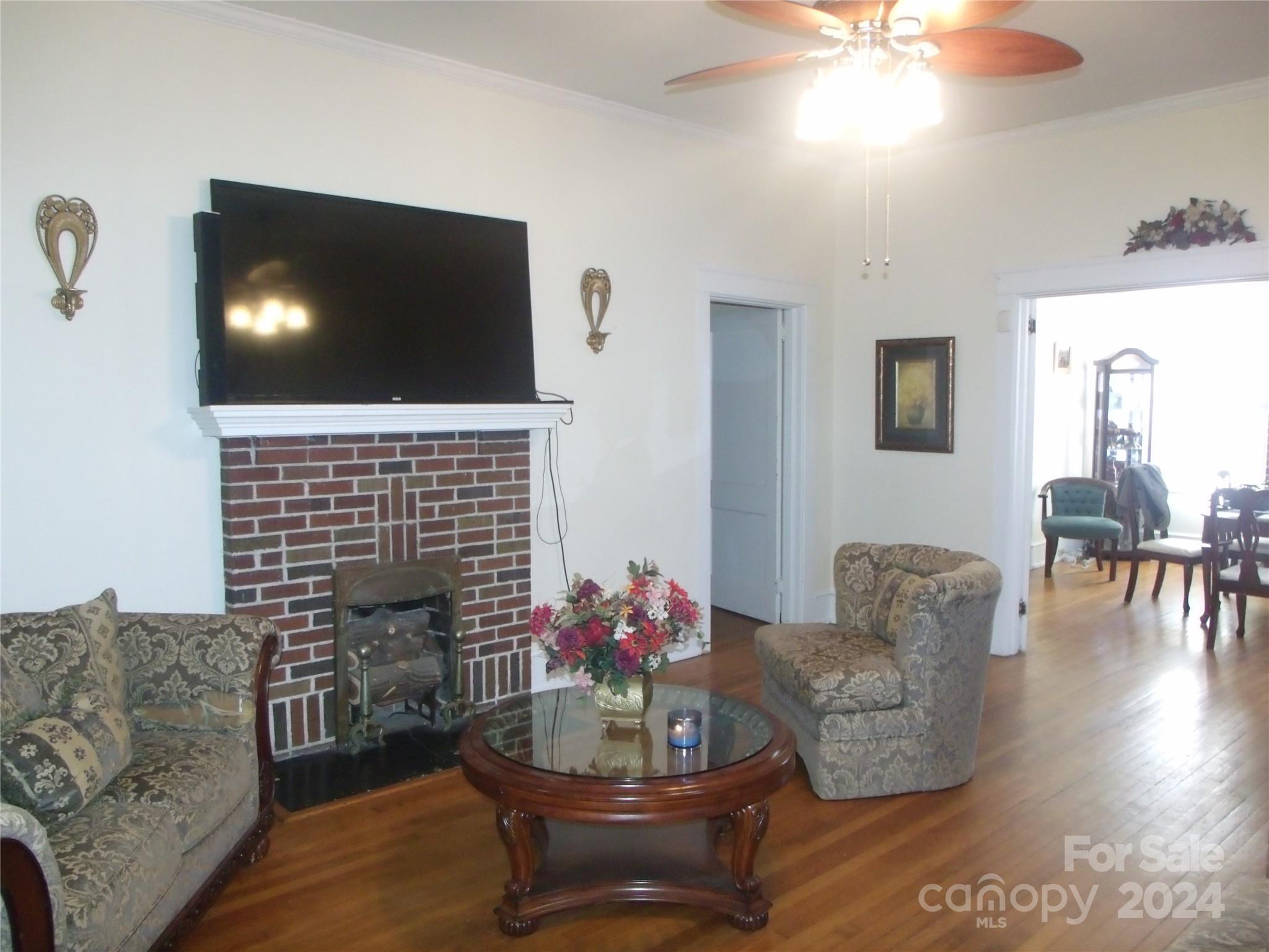 143 Lancaster Street Chester, SC 29706 - Photo 8 of 29 a living room with furniture and a flat screen tv