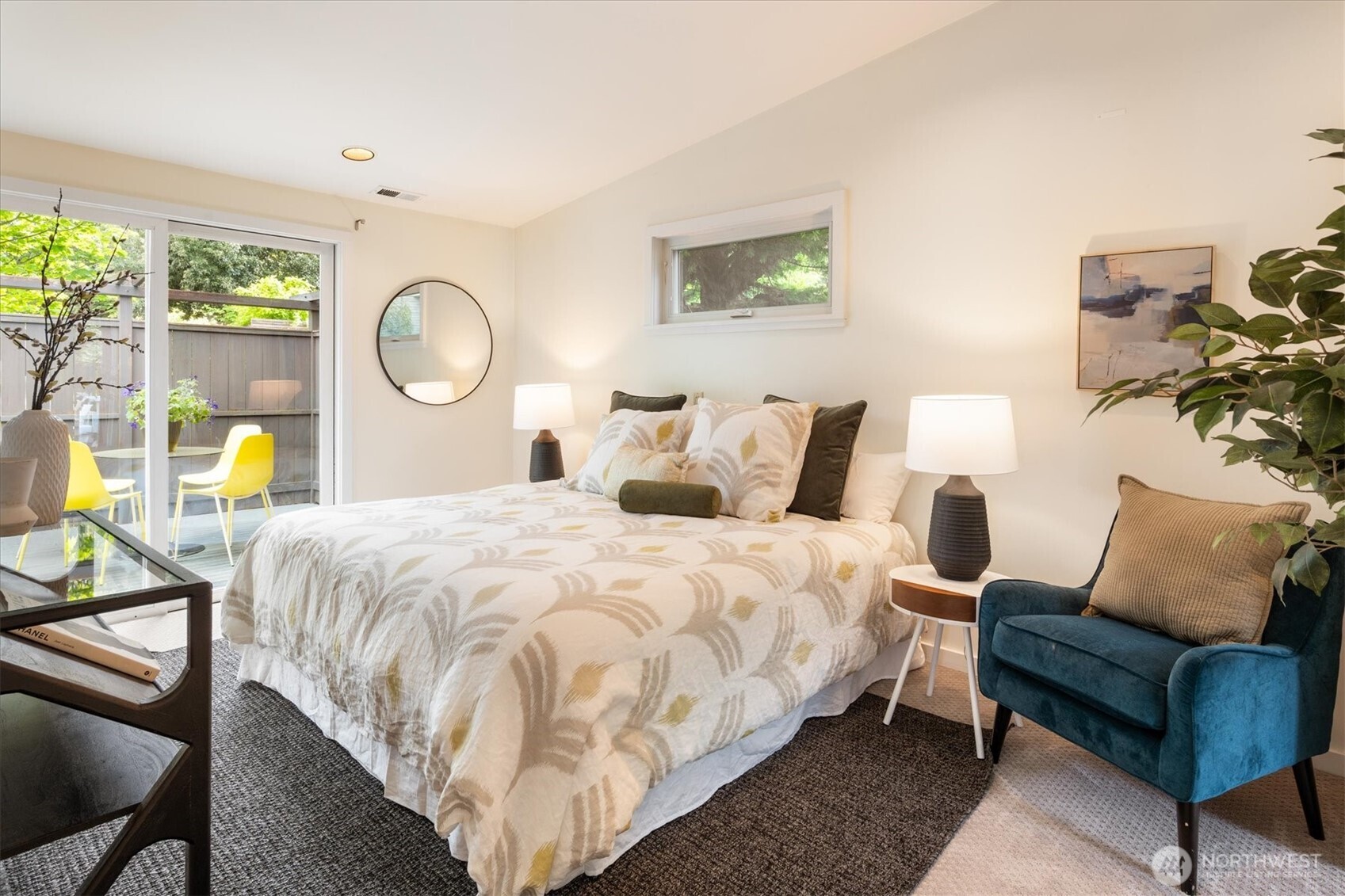 6420 Northeast 60th Street Seattle, WA 98115 - Photo 17 of 40 a bed room with a bed and a chair