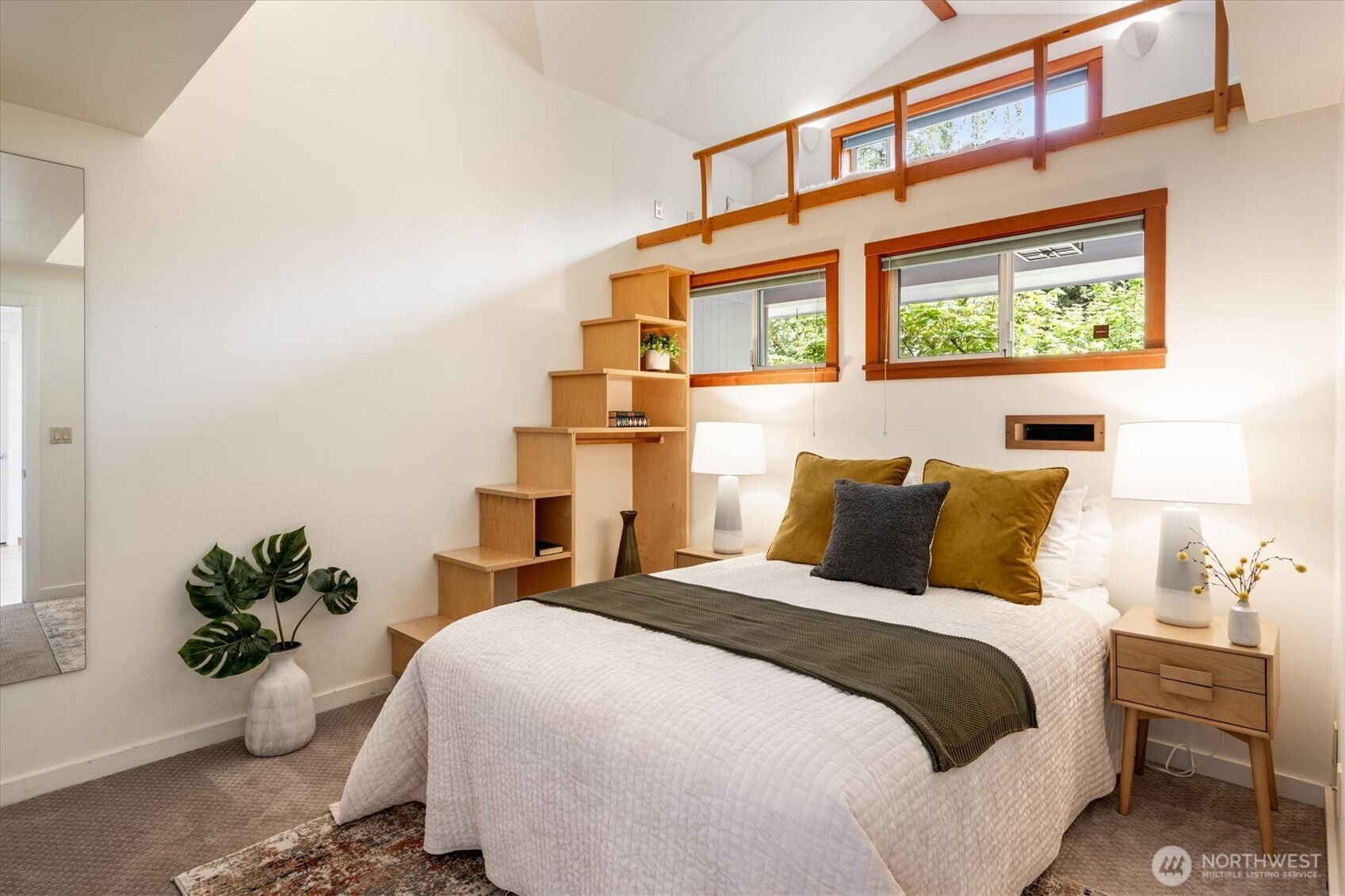 6420 Northeast 60th Street Seattle, WA 98115 - Photo 23 of 40 a bedroom with a bed table flowerpot and window