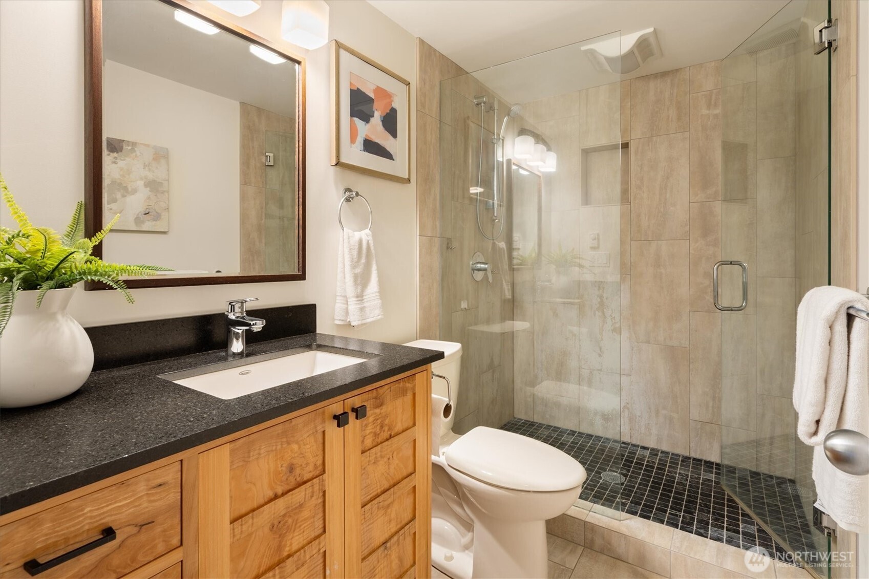 6420 Northeast 60th Street Seattle, WA 98115 - Photo 26 of 40 a bathroom with a granite countertop sink toilet and shower