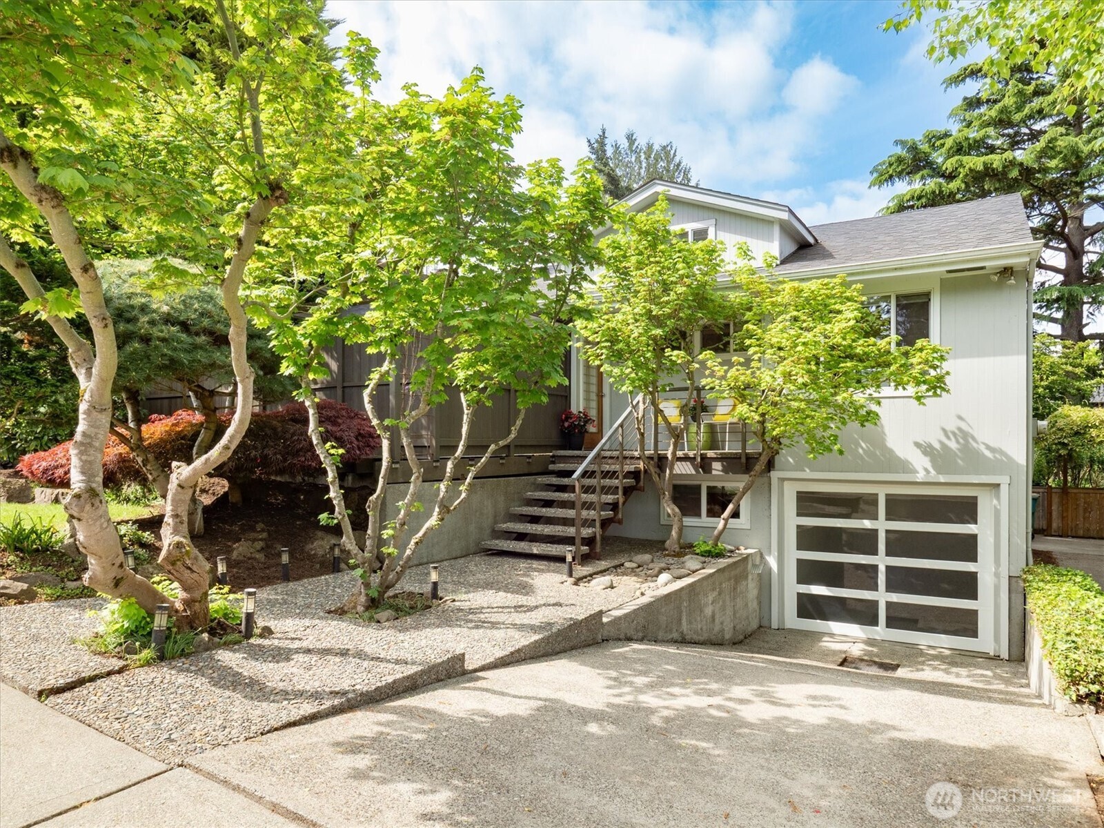 6420 Northeast 60th Street Seattle, WA 98115 - Photo 3 of 40 a house with trees in front of it