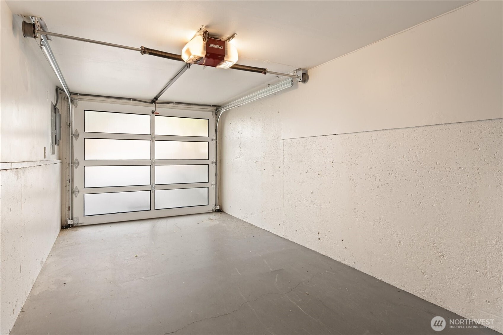 6420 Northeast 60th Street Seattle, WA 98115 - Photo 32 of 40 a view of an empty room with a window
