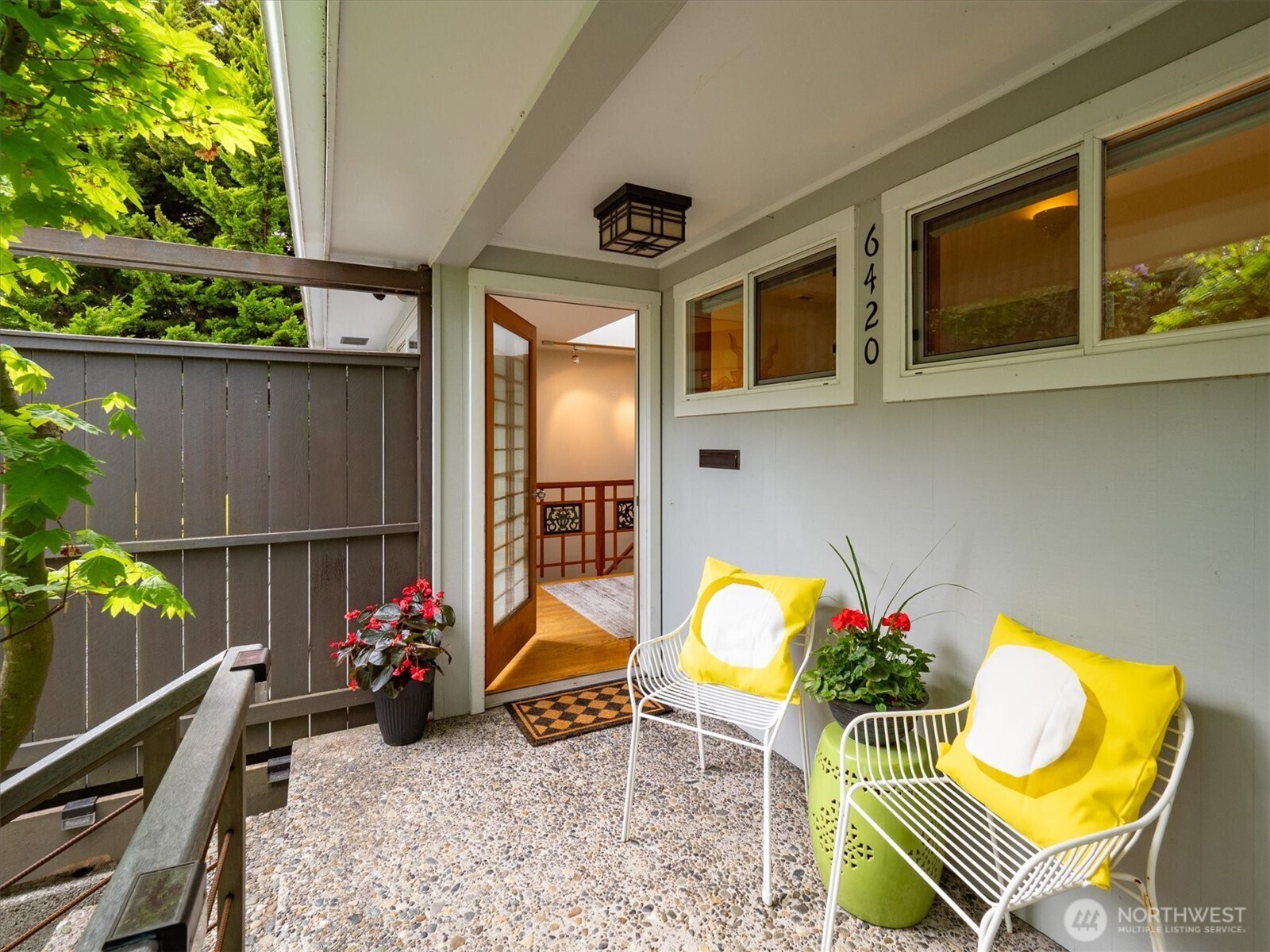 6420 Northeast 60th Street Seattle, WA 98115 - Photo 4 of 40 a view of a chairs and table in patio