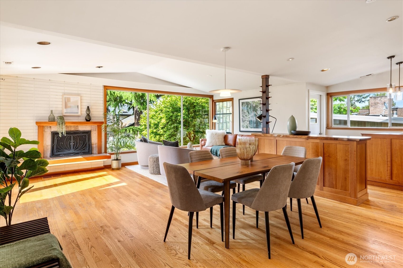 6420 Northeast 60th Street Seattle, WA 98115 - Photo 6 of 40 a dining room with furniture and a floor to ceiling window