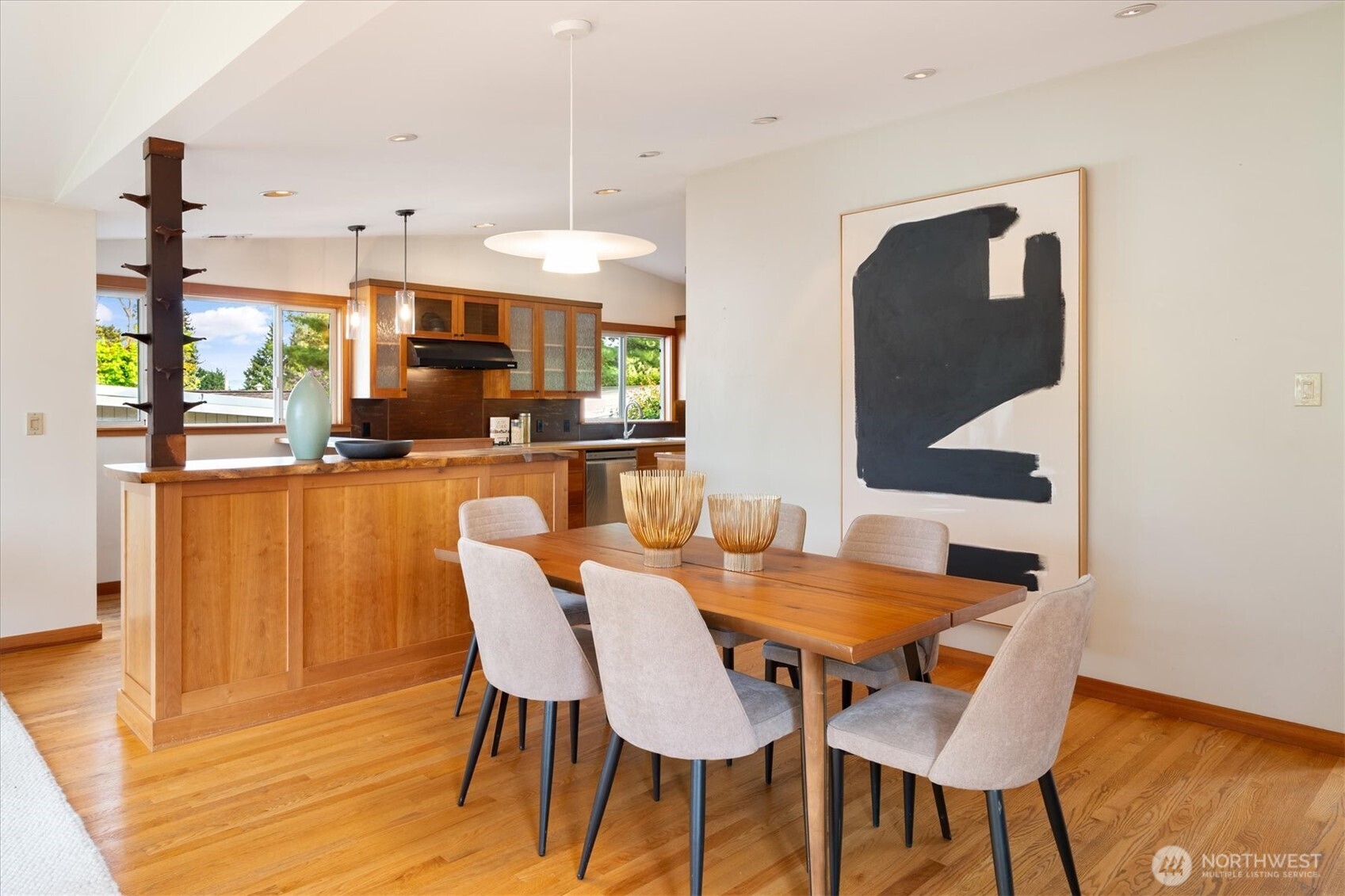 6420 Northeast 60th Street Seattle, WA 98115 - Photo 10 of 40 a view of a dining room with furniture and wooden floor