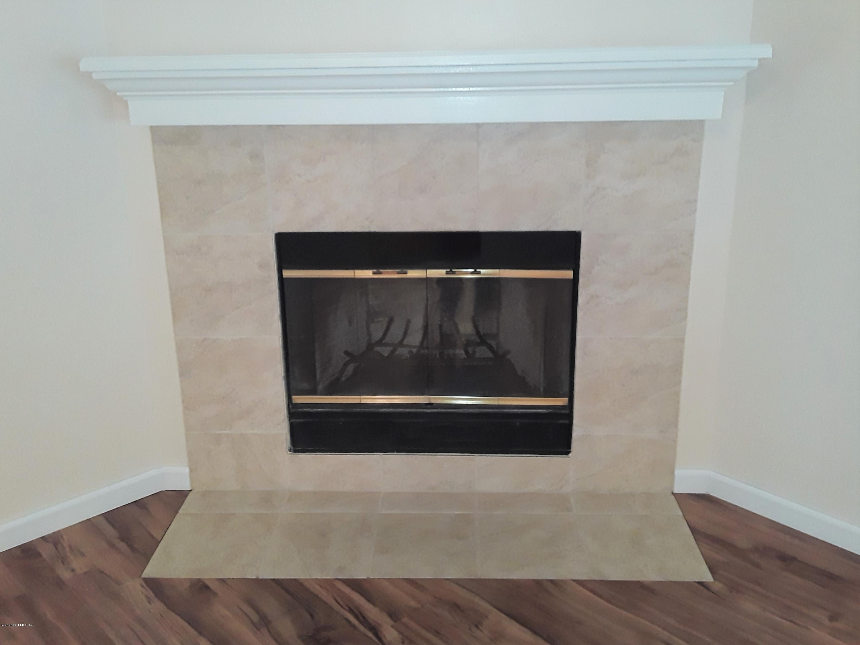 1296 Cutlass Road Orange Park, FL 32065 - Photo 8 of 18 Tiled Fireplace w/Mantle
