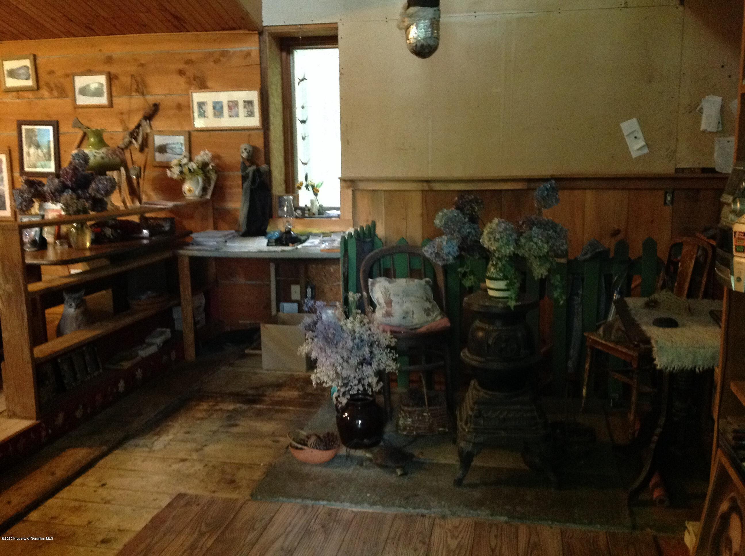 875 Marshall Squier Road Nicholson, PA 18446 - Photo 20 of 29 a room with musical instruments