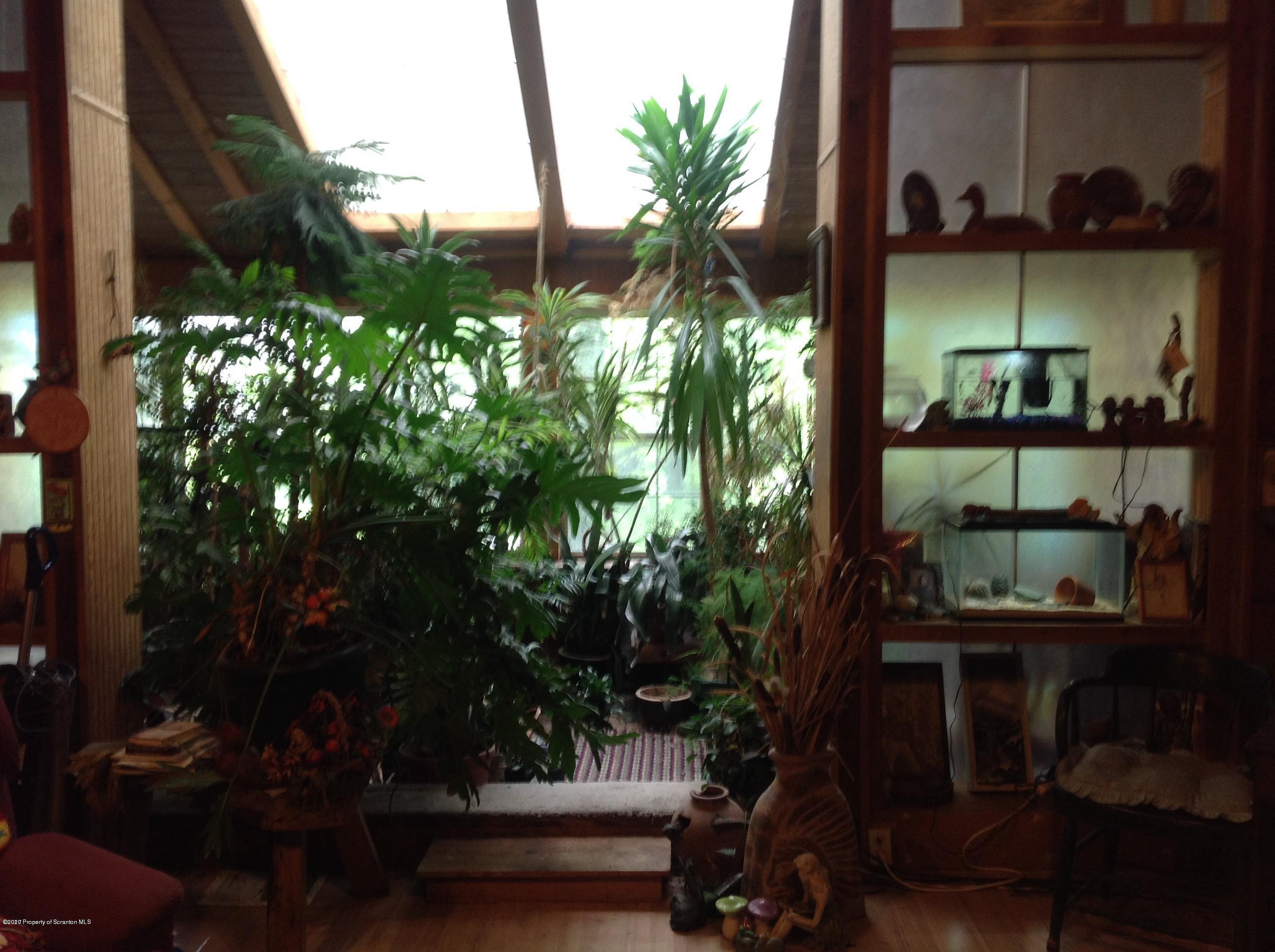 875 Marshall Squier Road Nicholson, PA 18446 - Photo 6 of 29 a view of a balcony with plants