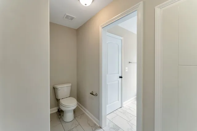 a bathroom with a toilet