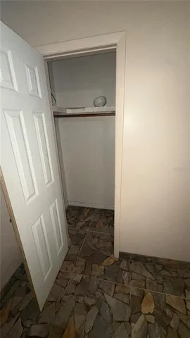 an empty room with a door