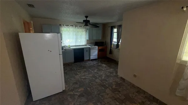 a view of a livingroom with a fireplace