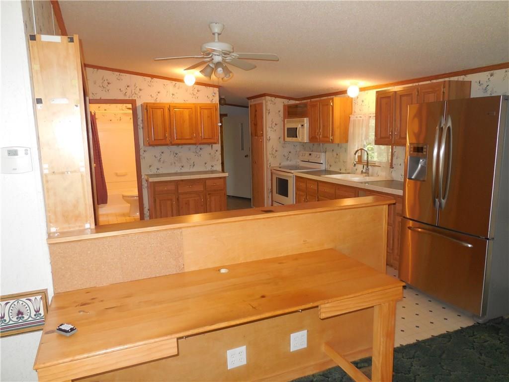 211 Brett Hill Road South Paris, ME 04281 - Photo 20 of 35 Another shot of the kitchen from...