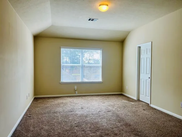 an empty room with window