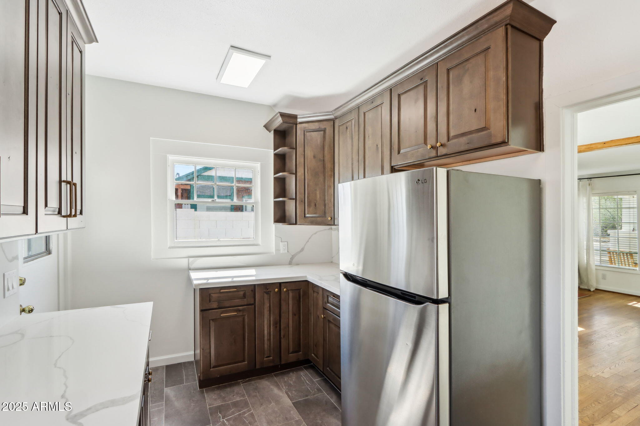 2237 North 9th Street Phoenix, AZ 85006 - Photo 12 of 29 a white refrigerator freezer sitting inside of a kitchen