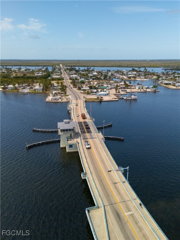 5500 Stringfellow Road St. James City, FL 33956 - Photo 15 of 22 a view of a balcony with ocean view