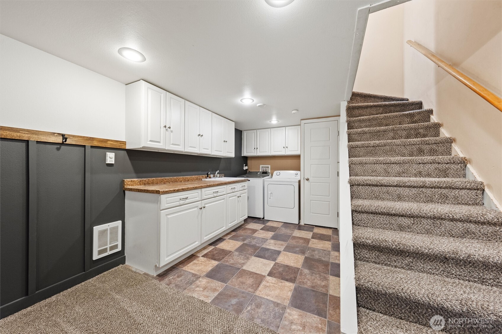 246 Maringo Road Ephrata, WA 98823 - Photo 30 of 40 a kitchen with white cabinets and white appliances