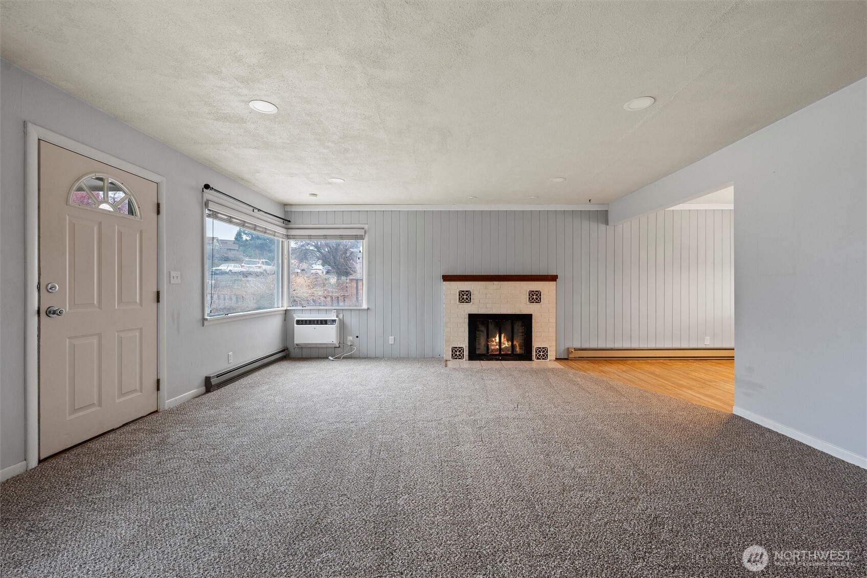 246 Maringo Road Ephrata, WA 98823 - Photo 8 of 40 an empty room with fireplace and windows