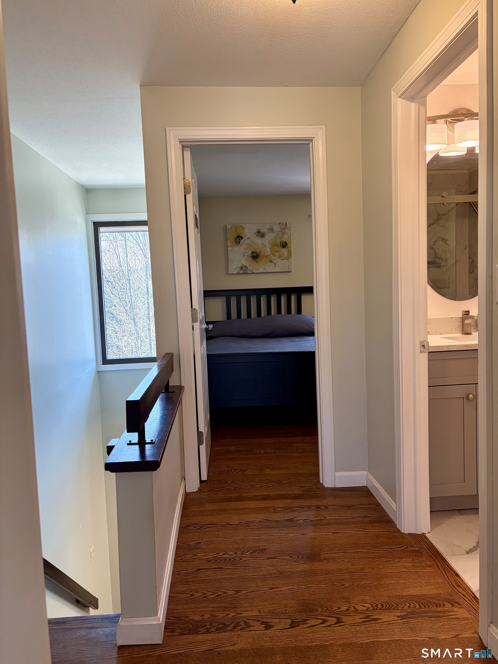 216 Natchaug Drive, Unit 216 Meriden, CT 06450 - Photo 14 of 40 a view of an entryway with wooden floor