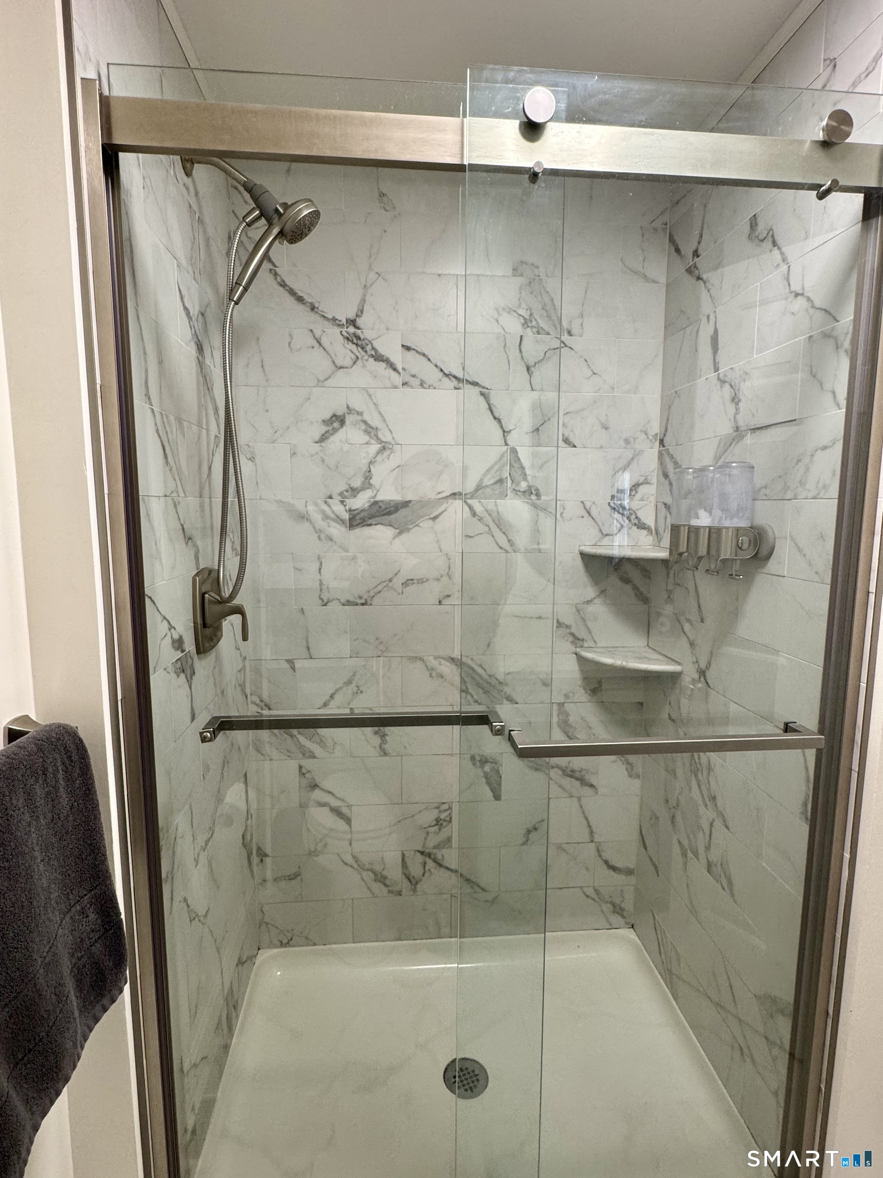 216 Natchaug Drive, Unit 216 Meriden, CT 06450 - Photo 17 of 40 a bathroom with a shower