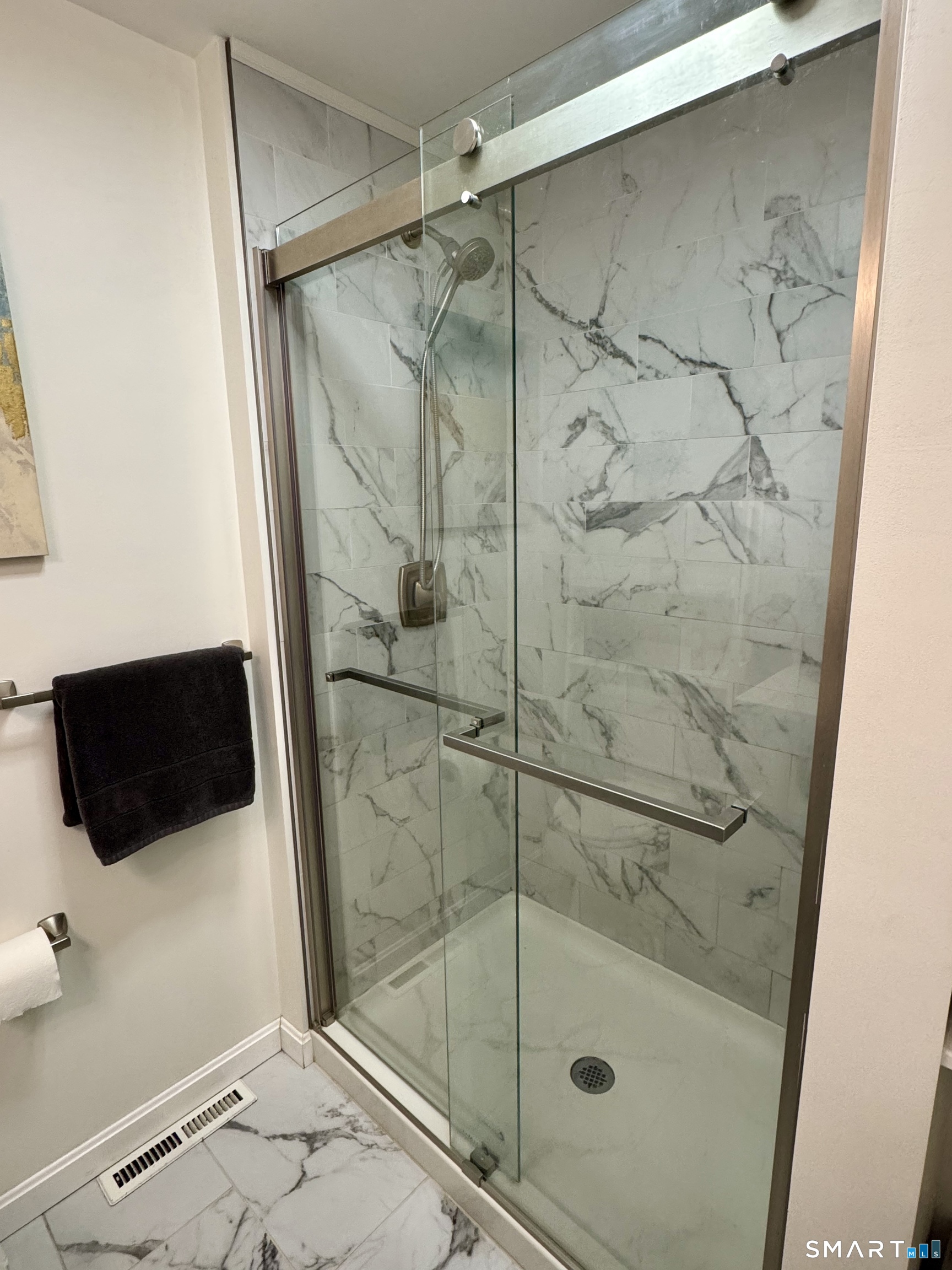 216 Natchaug Drive, Unit 216 Meriden, CT 06450 - Photo 18 of 40 a bathroom with a shower and toilet